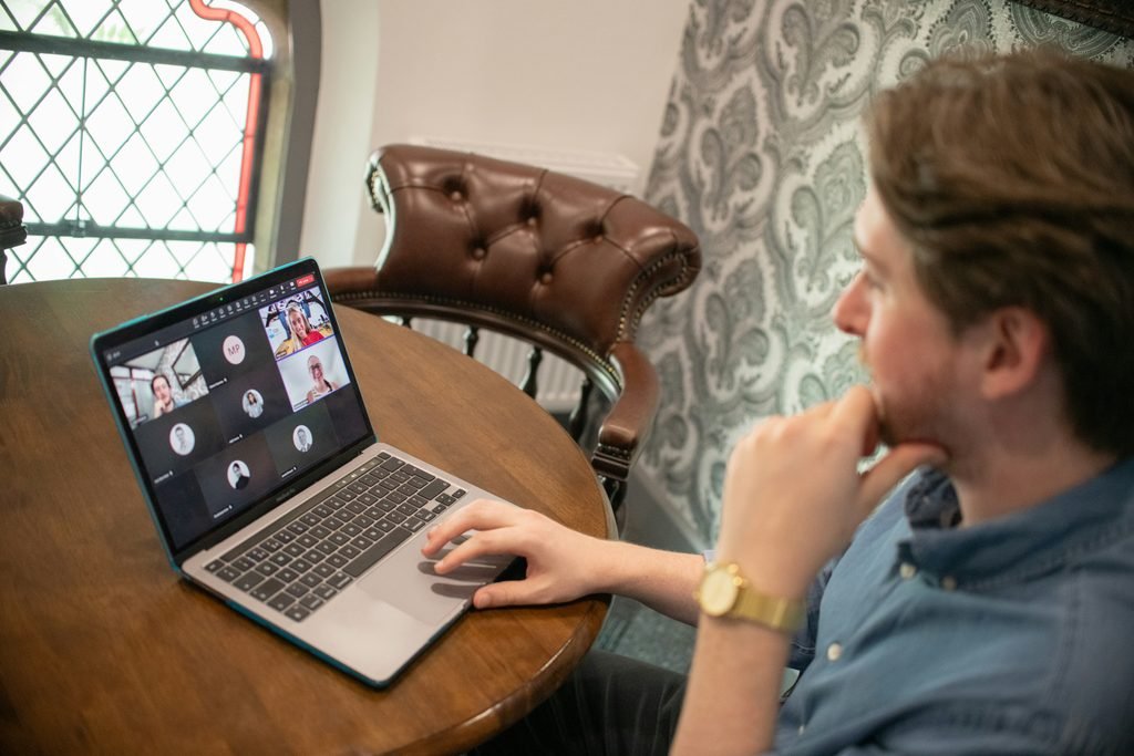 Virtual meeting on laptop screen