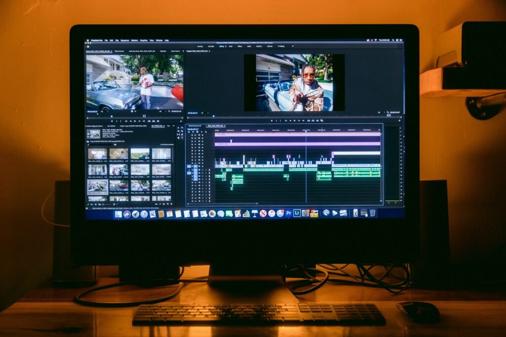 Photographer editing photos on laptop