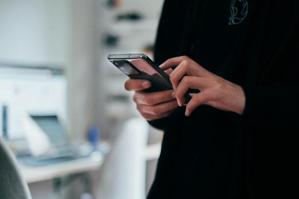 person typing on a. smartphone messaging screen