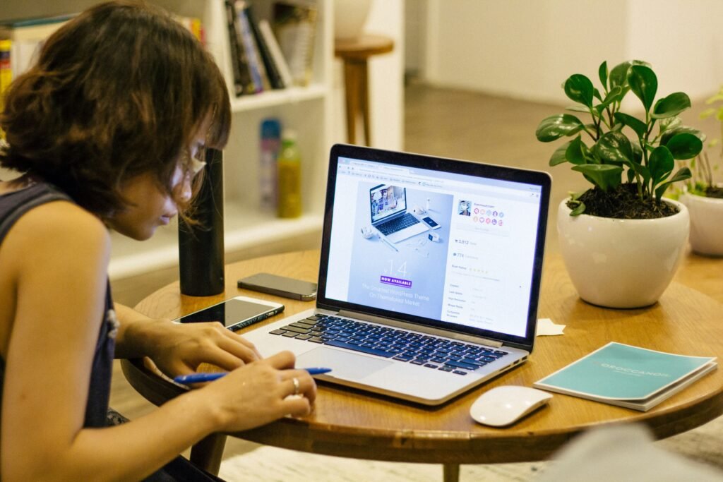 Woman's hands shopping online on laptop