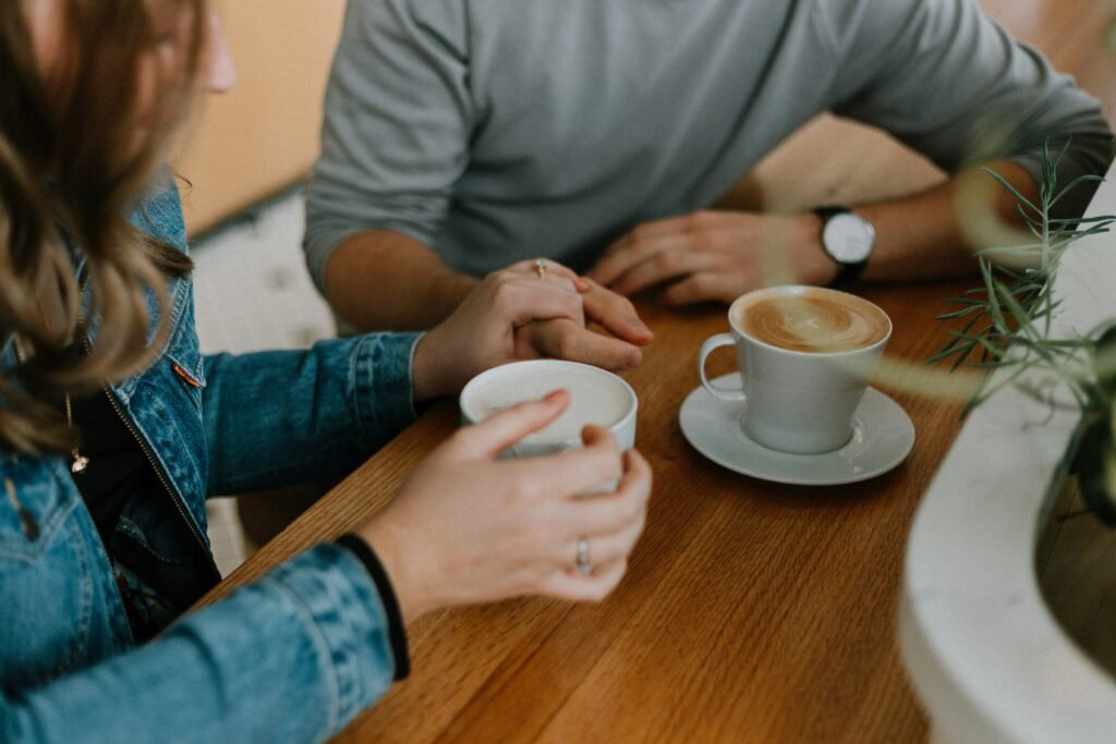 two people coffee conversation talking